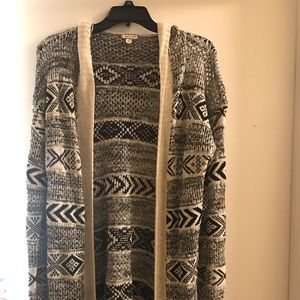 Black and cream colored cardigan